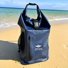 Dry bag backpack on beach
